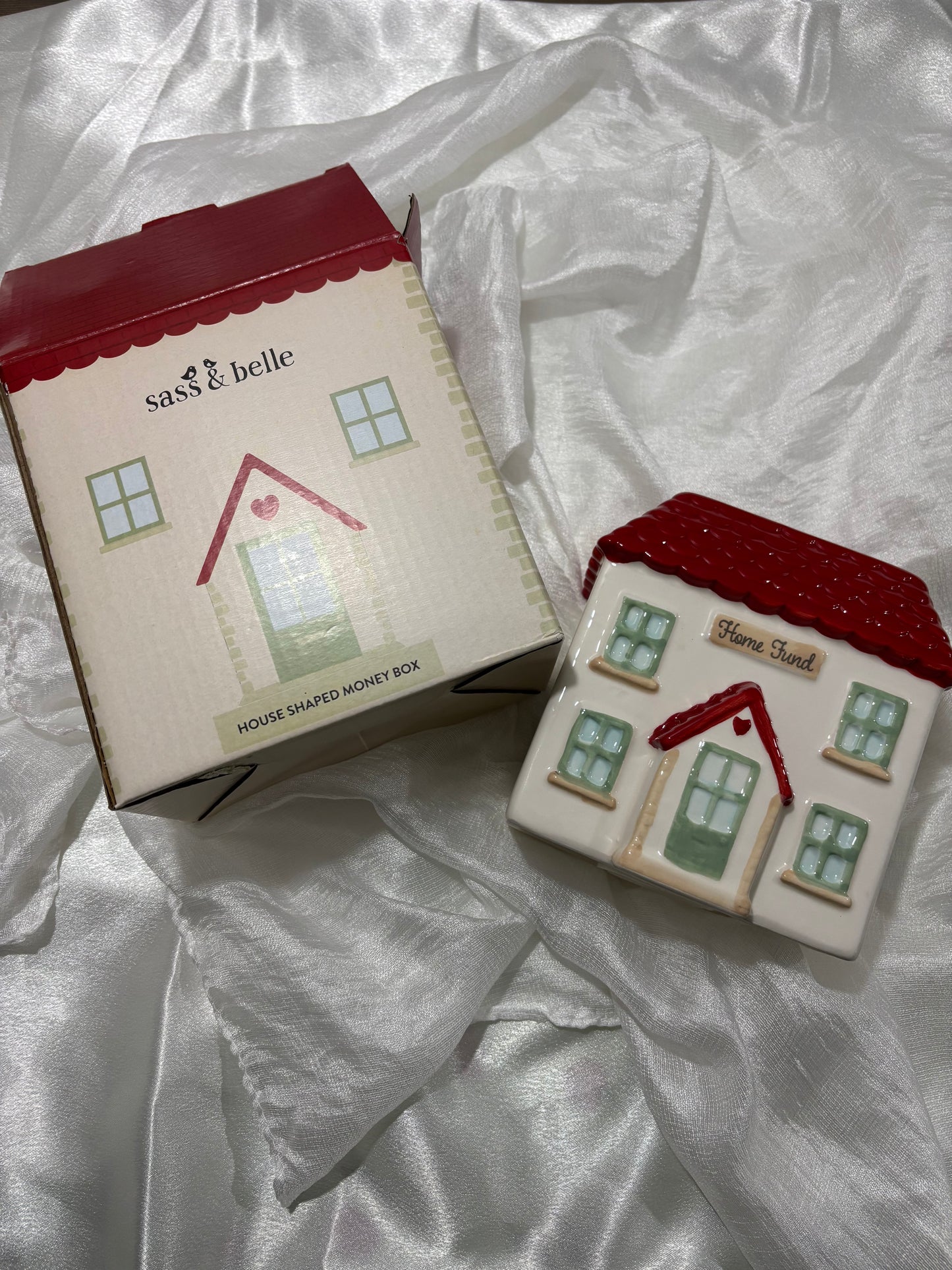 Spaarpot in de vorm van een huis