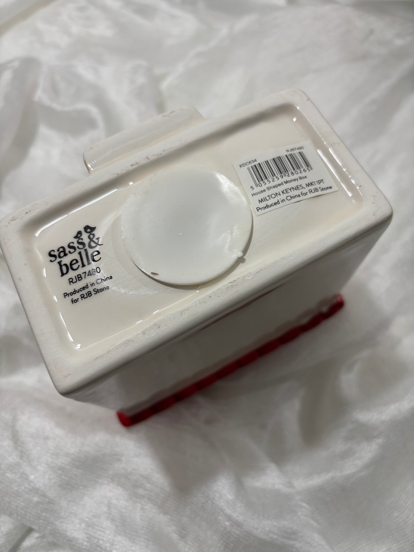 Spaarpot in de vorm van een huis