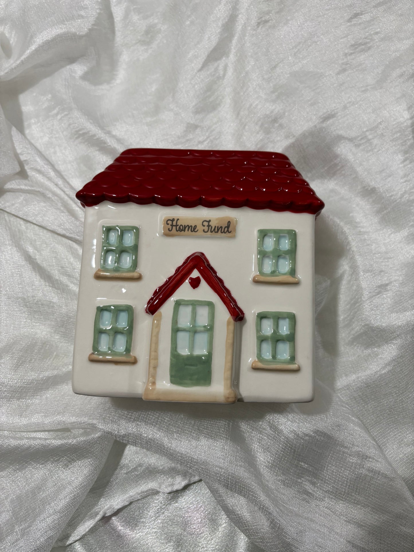 Spaarpot in de vorm van een huis