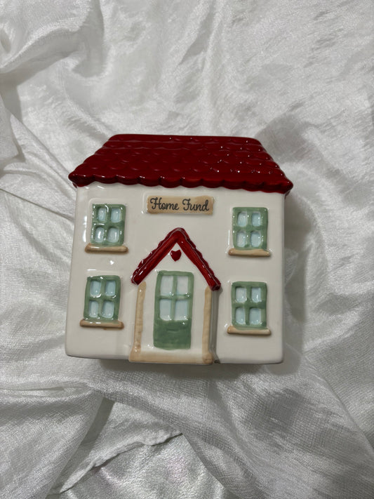 Spaarpot in de vorm van een huis